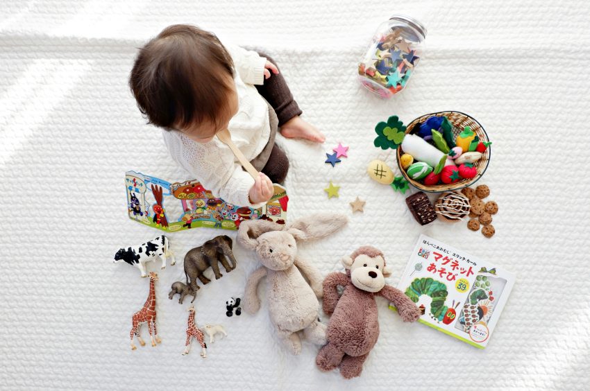 A bunch of baby's accessories that can be found in baby registry boxes.